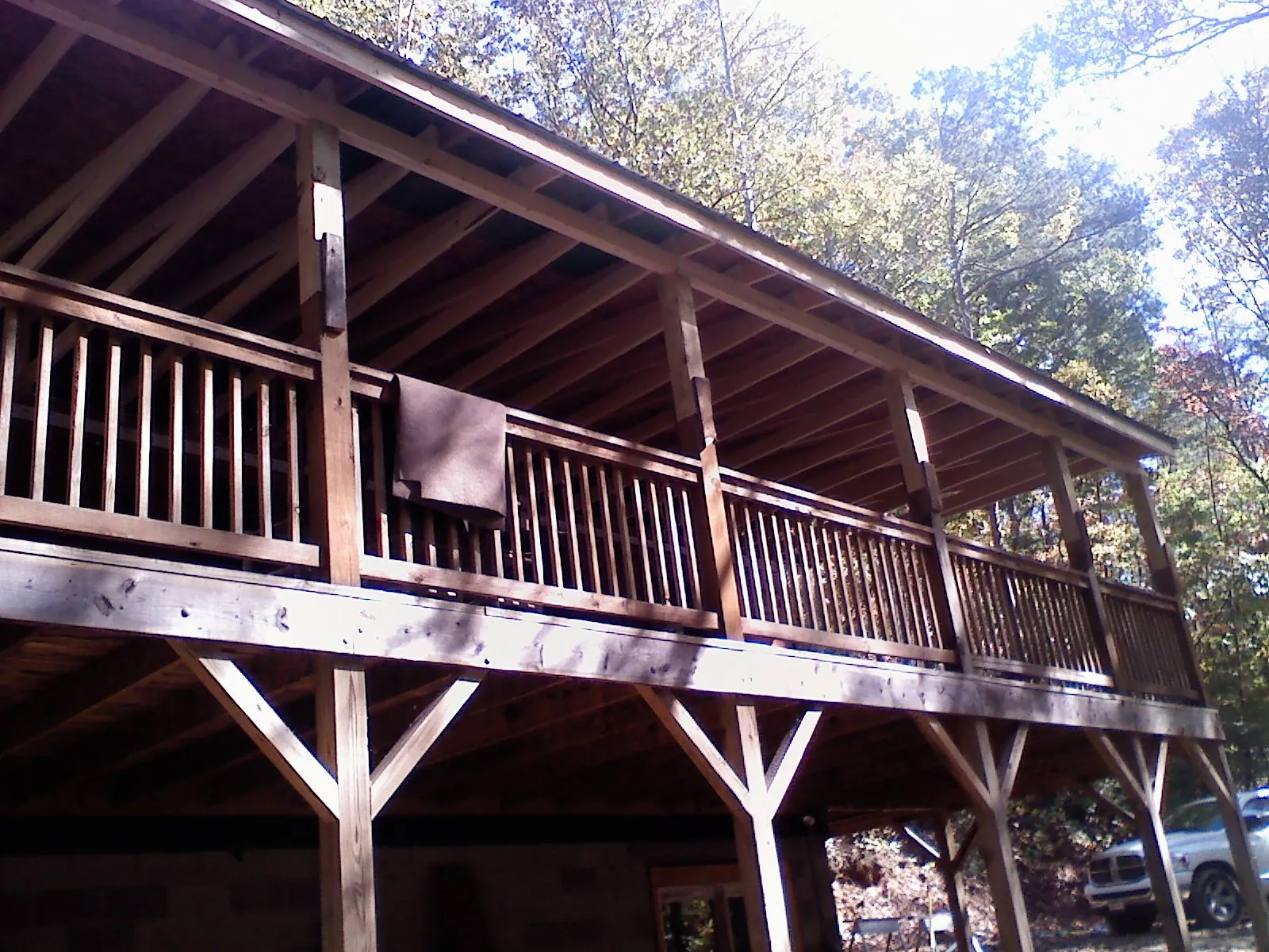 Timber framing under a new elevated porch and deck — Roof Leak Repair in Elkmont by Roofing Brothers